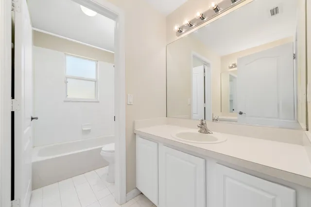 a view of a small space with racks on the wall