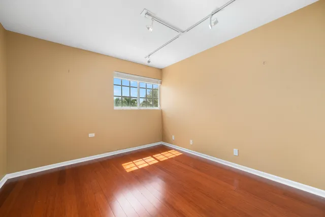 a view of a hallway with closet area