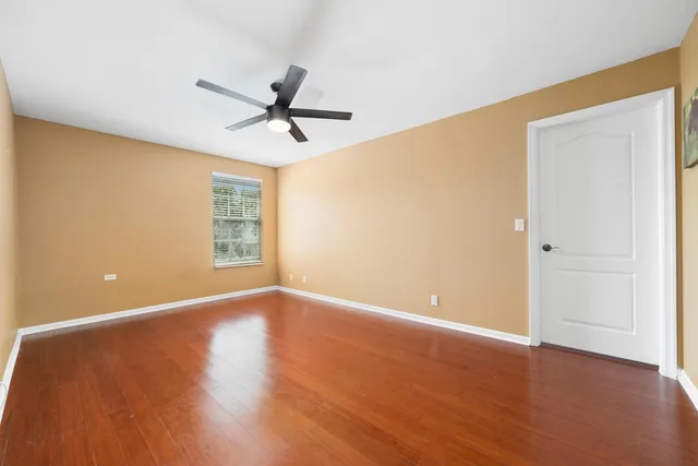 an aerial view of residential houses with outdoor space and river