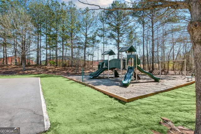 a view of a park with swings