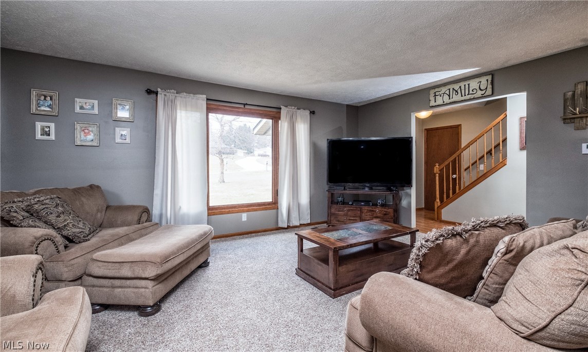 1762 Killian Road Akron, OH 44312 - Photo 4 of 20 Spacious Living room with newer carpet and large picture window