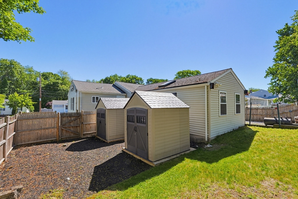 118 Spruce Road Norwood, MA 02062 - Photo 37 of 39 a view of a house with a yard