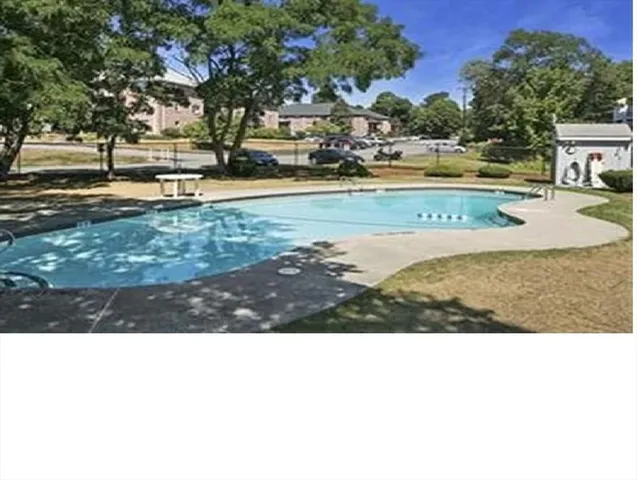 a view of a swimming pool with an outdoor space