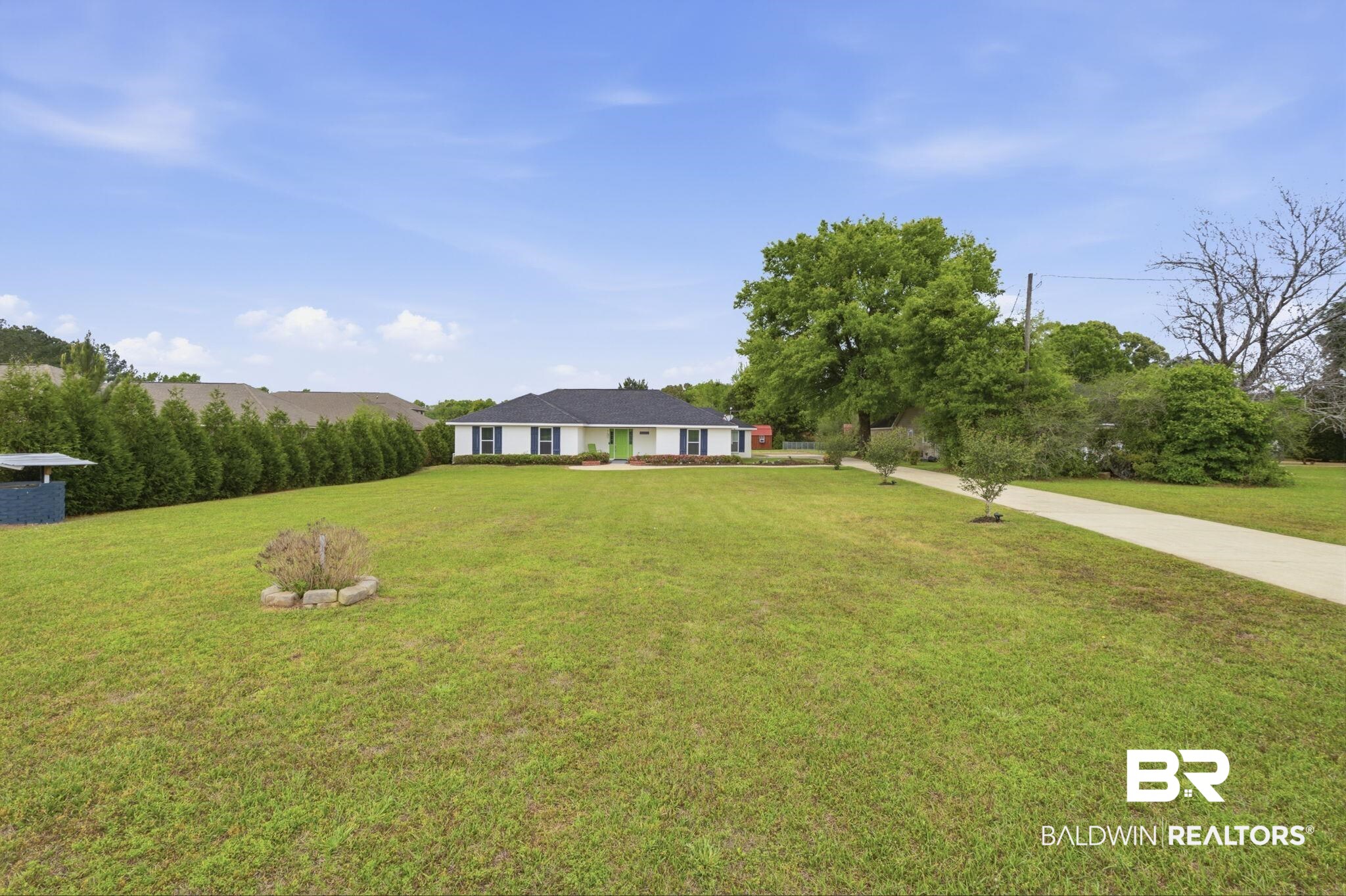 10670 Jeff Hamilton Road Mobile, AL 36695 - Photo 13 of 43 View of front of house with a front lawn