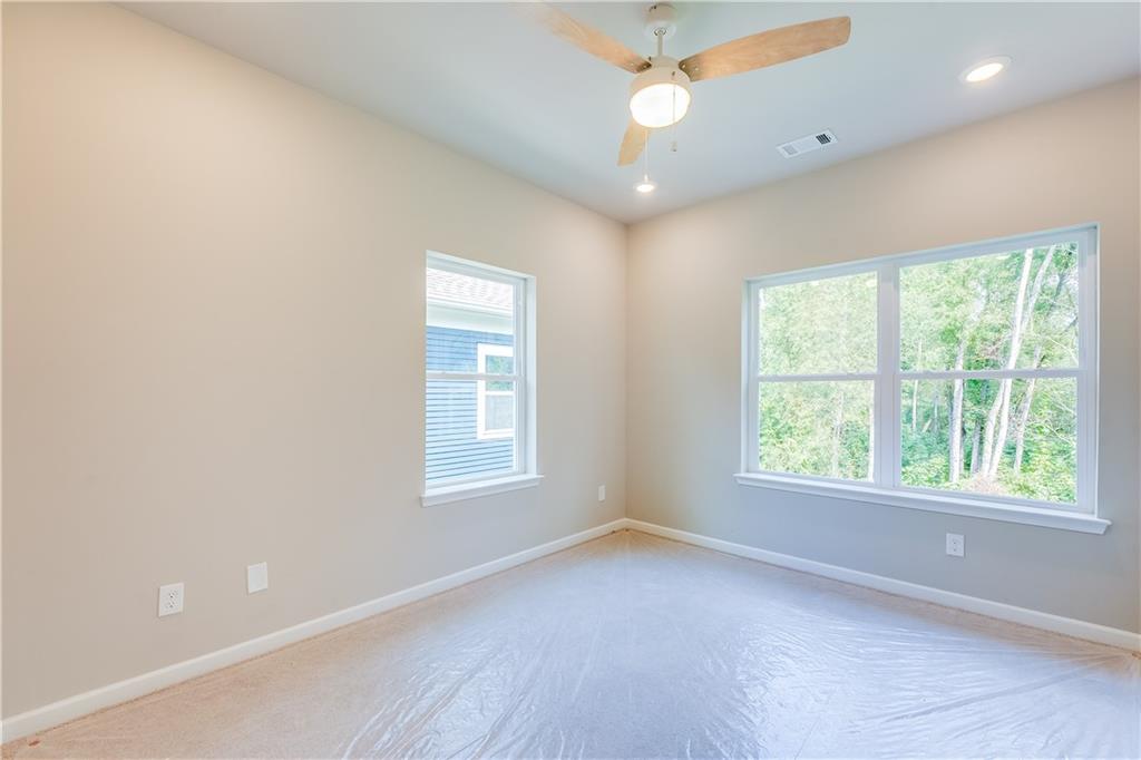 960 Lawton Street Southwest Atlanta, GA 30310 - Photo 8 of 16 a view of an empty room with a window
