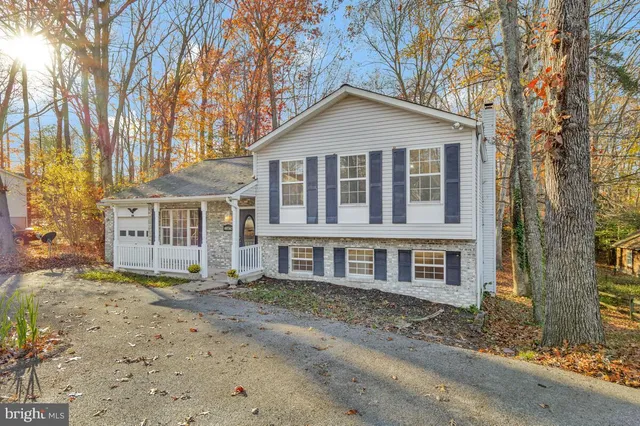 front view of a house with a small yard