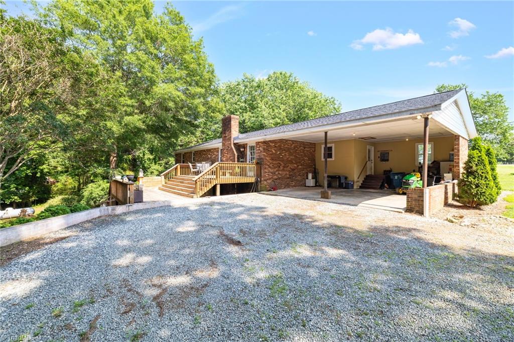 8194 Brotherstwo Road Colfax, NC 27235 - Photo 32 of 47 Driveway and Carport