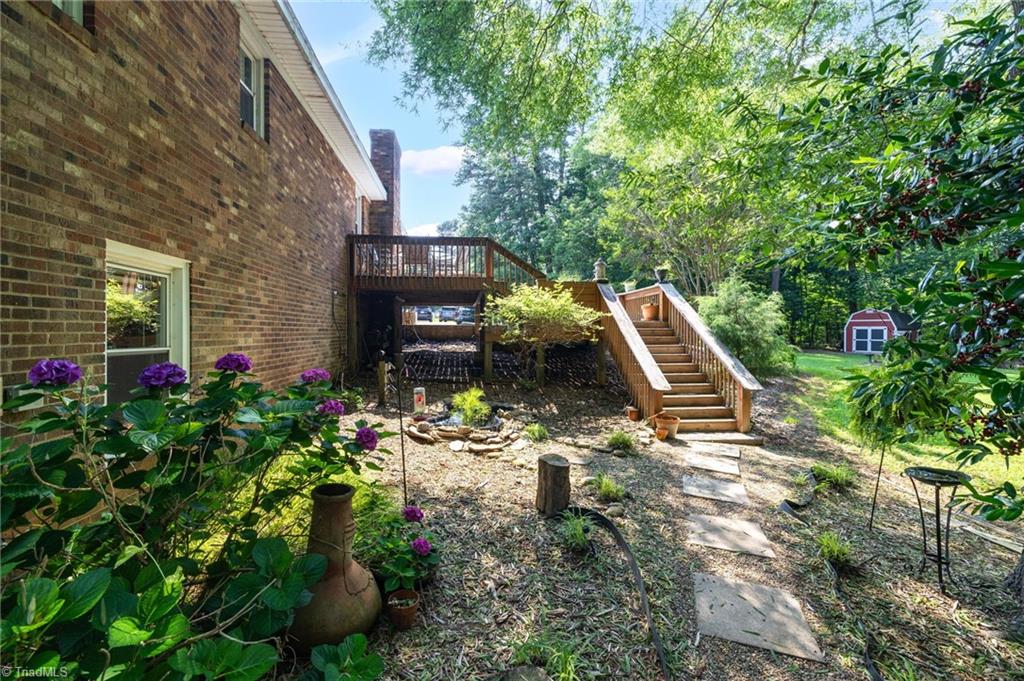 8194 Brotherstwo Road Colfax, NC 27235 - Photo 37 of 47 Back Yard/Deck