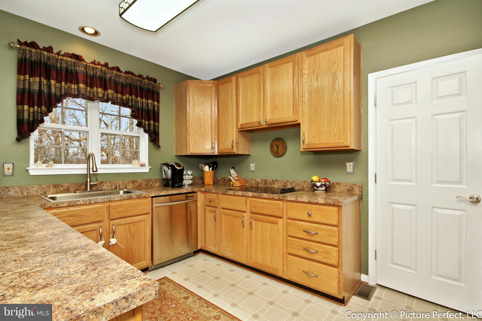 6418 Spring Forest Road Frederick, MD 21701 - Photo 15 of 30 Kitchen With New Cooktop