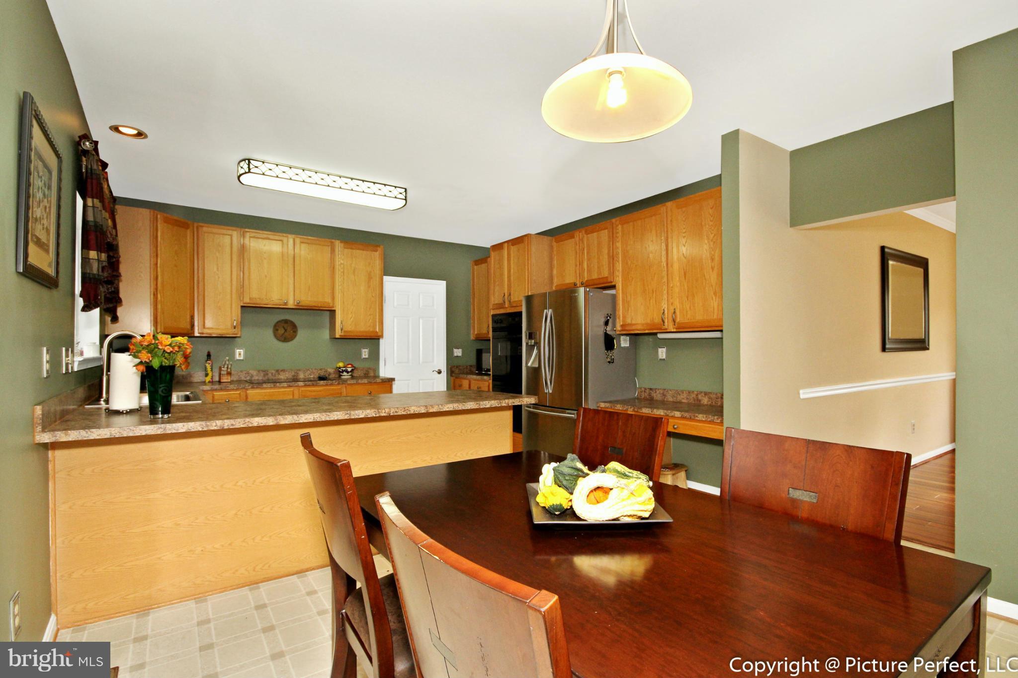 6418 Spring Forest Road Frederick, MD 21701 - Photo 16 of 30 Kitchen With Breakfast Area