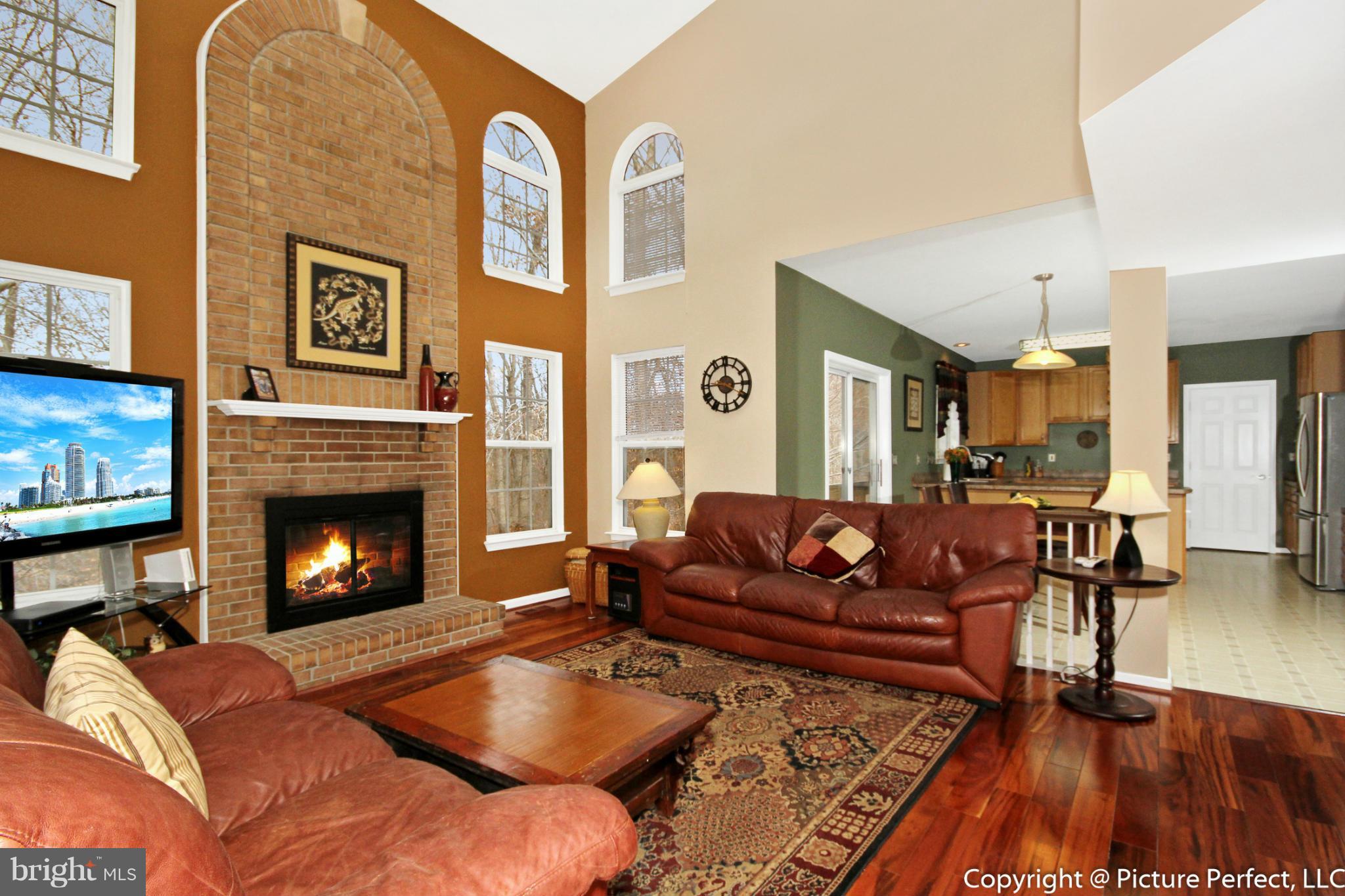 6418 Spring Forest Road Frederick, MD 21701 - Photo 8 of 30 Floor to ceiling brick fireplace