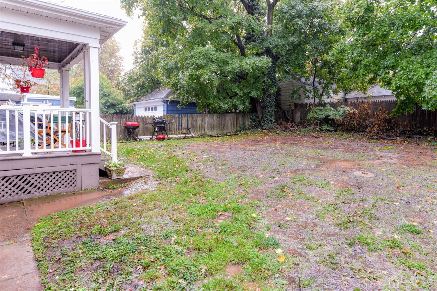 36 Baldwin Street New Brunswick, NJ 08901 - Photo 3 of 22 a house view with a backyard space
