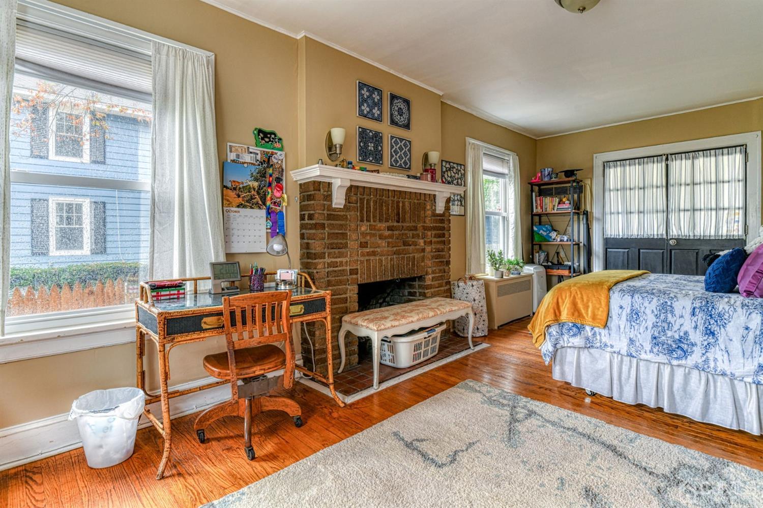 36 Baldwin Street New Brunswick, NJ 08901 - Photo 5 of 22 a bedroom with furniture and a window