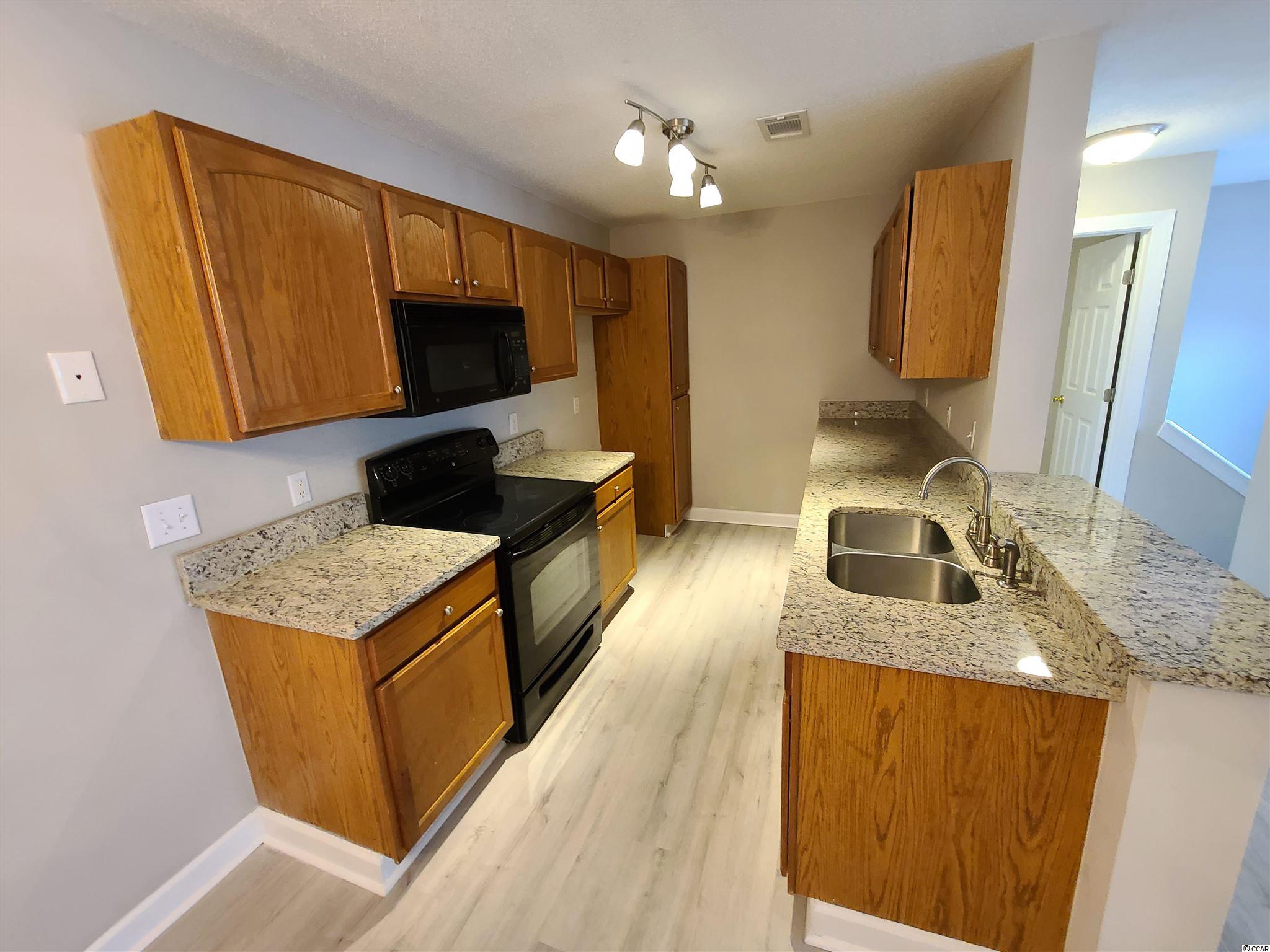 4370 Crepe Myrtle Court, Unit E Murrells Inlet, SC 29576 - Photo 8 of 17 Gallery Image 8