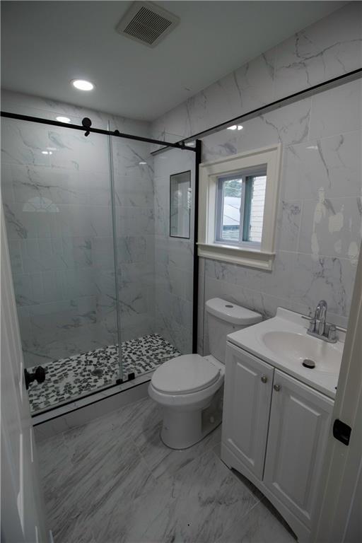 1292 Monfort Road Lawrenceville, GA 30046 - Photo 27 of 48 a bathroom with a sink toilet and shower