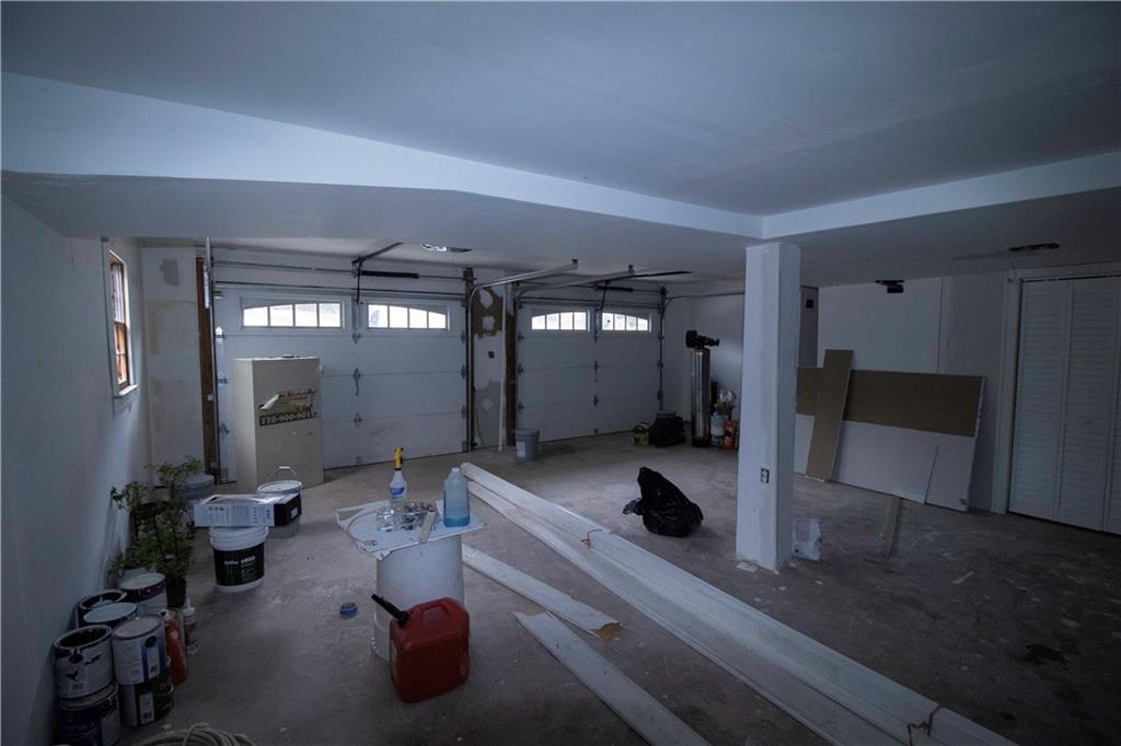 1292 Monfort Road Lawrenceville, GA 30046 - Photo 36 of 48 a room with gym equipment