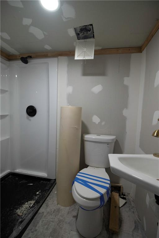 1292 Monfort Road Lawrenceville, GA 30046 - Photo 42 of 48 a bathroom with a sink and toilet