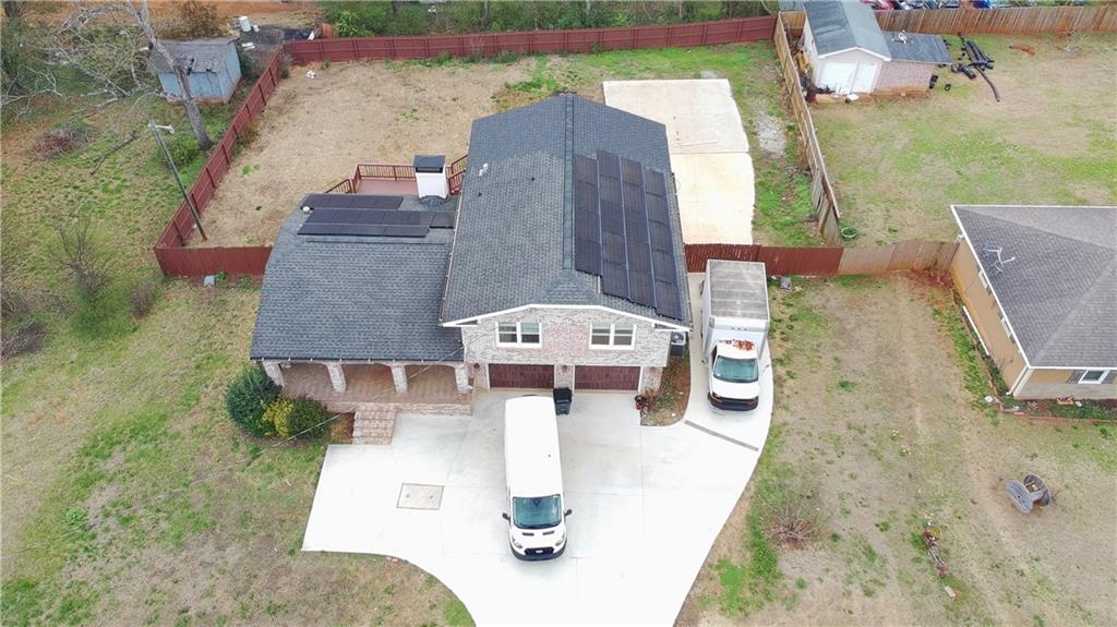 1292 Monfort Road Lawrenceville, GA 30046 - Photo 44 of 48 an aerial view of a house with outdoor space