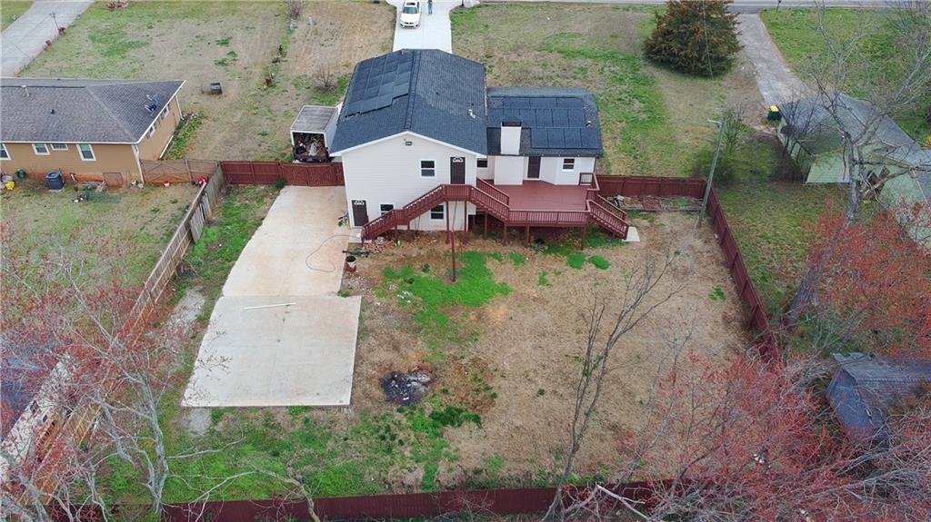 1292 Monfort Road Lawrenceville, GA 30046 - Photo 46 of 48 an aerial view of a house with garden space and street view