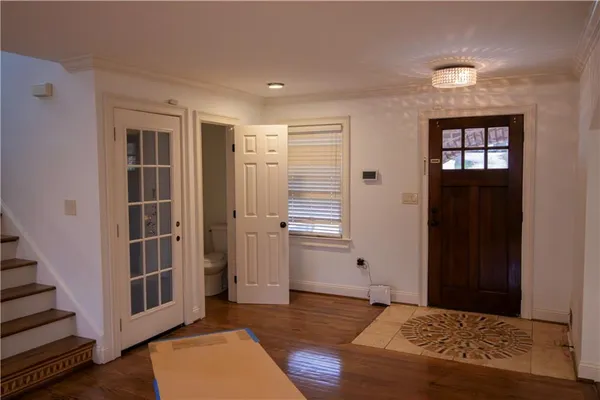 a bedroom with windows