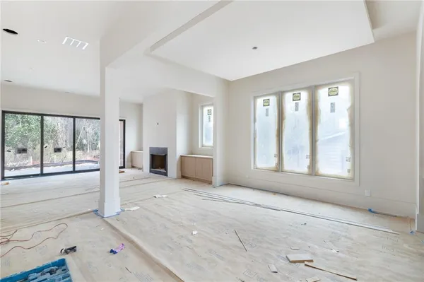 a kitchen with stainless steel appliances kitchen island granite countertop a sink a stove and cabinets