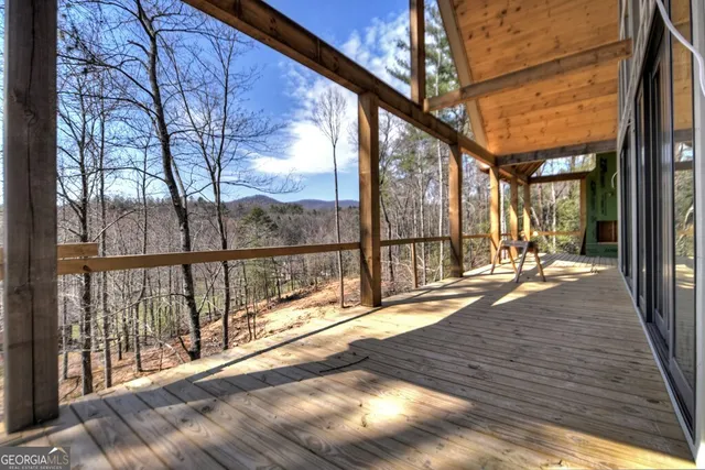 a view of steet with deck