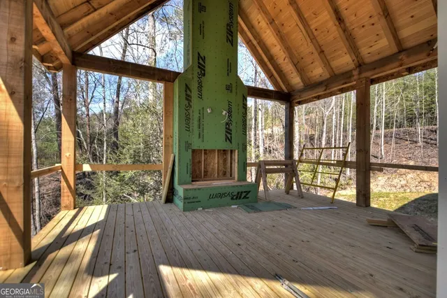 a view of porch with wooden floor and outdoor space