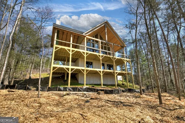 a view of a house with a mountain
