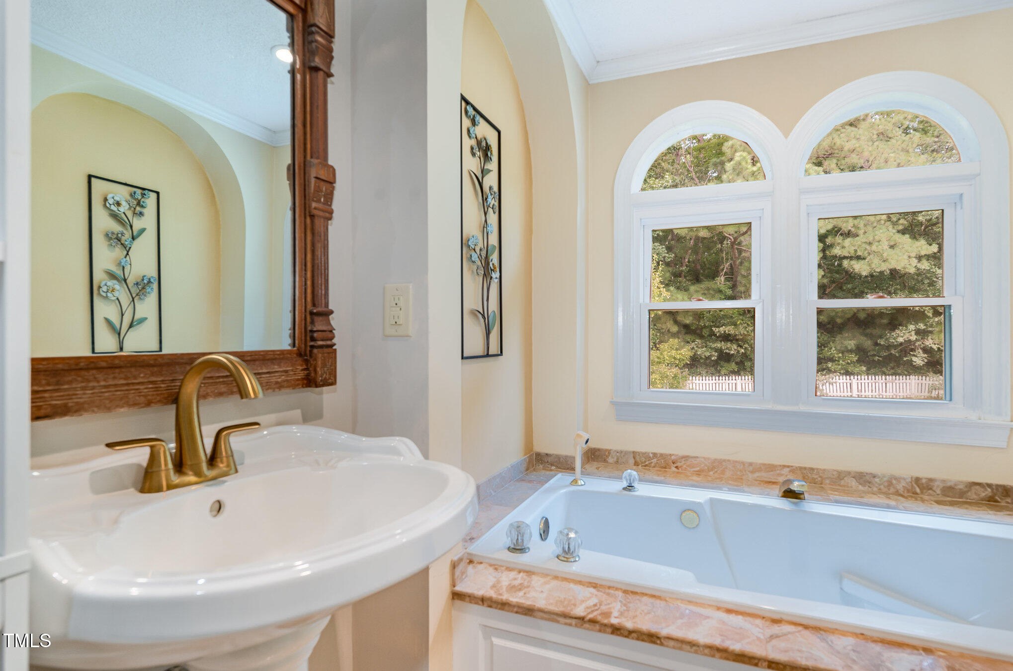 2601 Forestville Road Wake Forest, NC 27587 - Photo 17 of 25 a bathroom with a sink and a bathtub