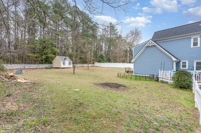 a house with trees in front of it