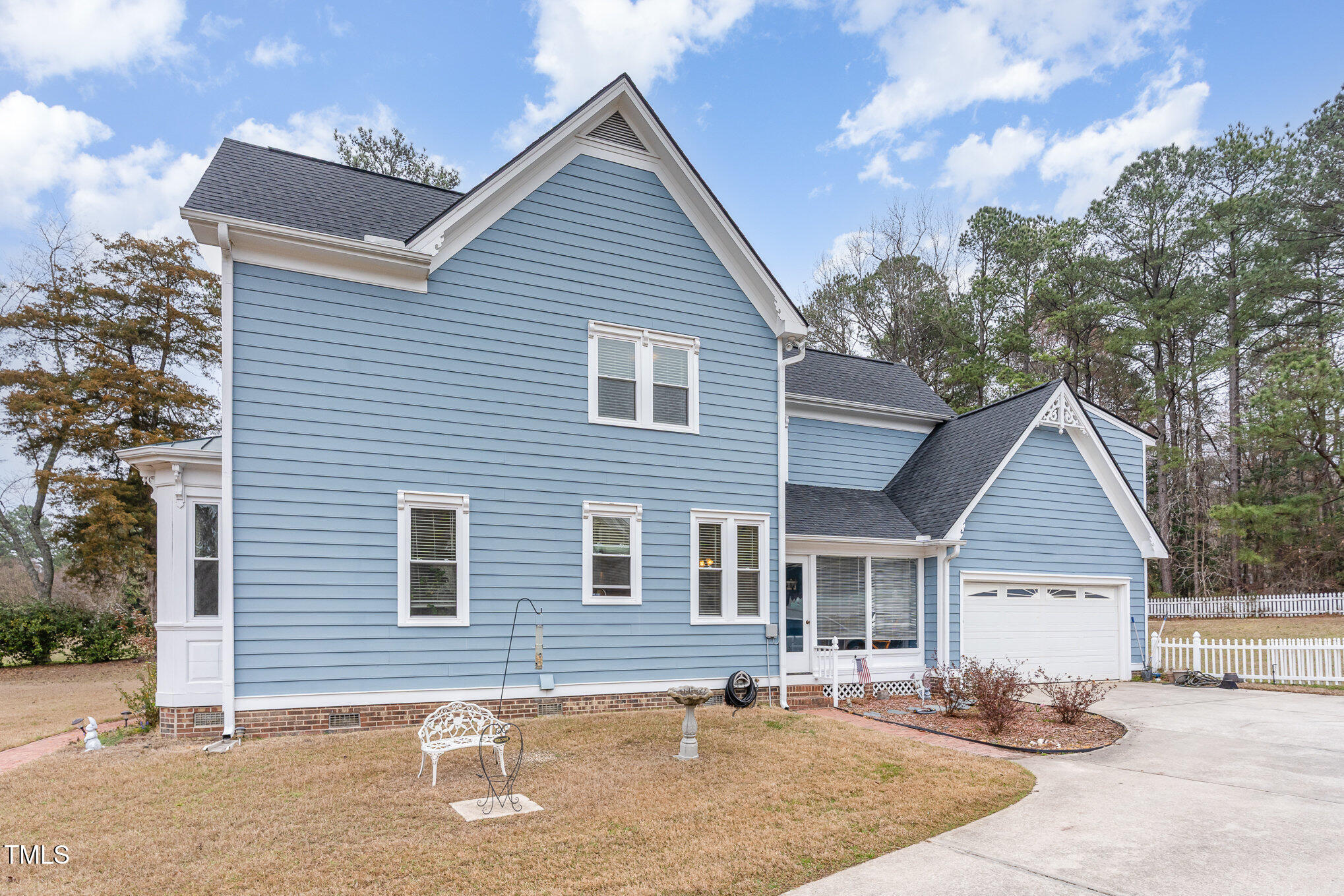 2601 Forestville Road Wake Forest, NC 27587 - Photo 2 of 25 a front view of a house with a patio