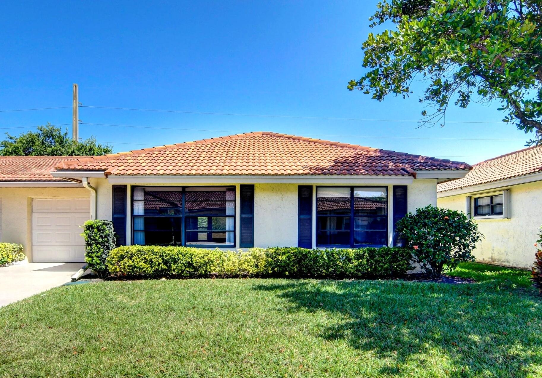 4515 Pandanus Tree Road, Unit B Boynton Beach, FL 33436 - Photo 1 of 20 Front