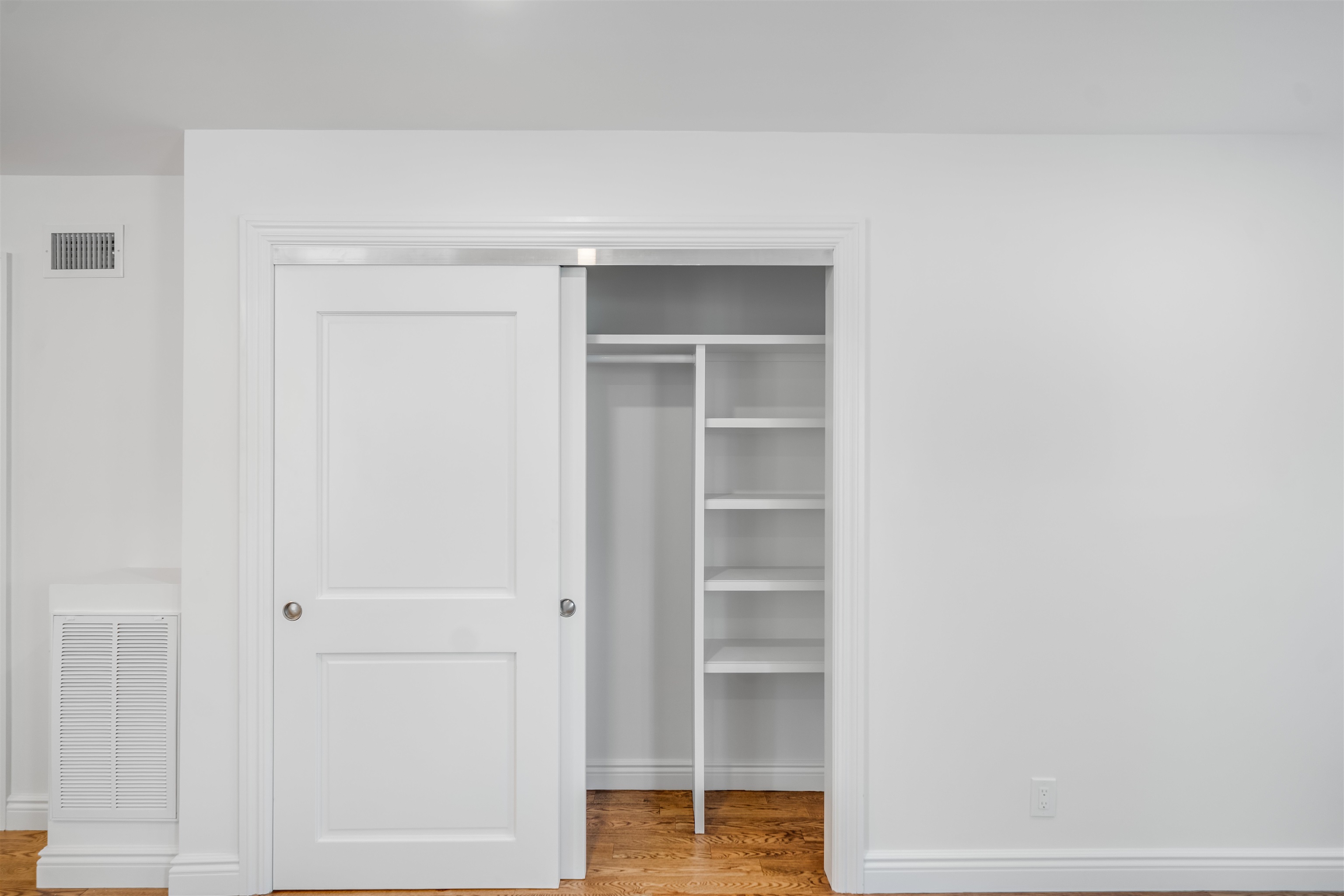 11 Walnut Street, Unit 1 Little Falls, NJ 07424 - Photo 11 of 24 a view of walk in closet with empty racks