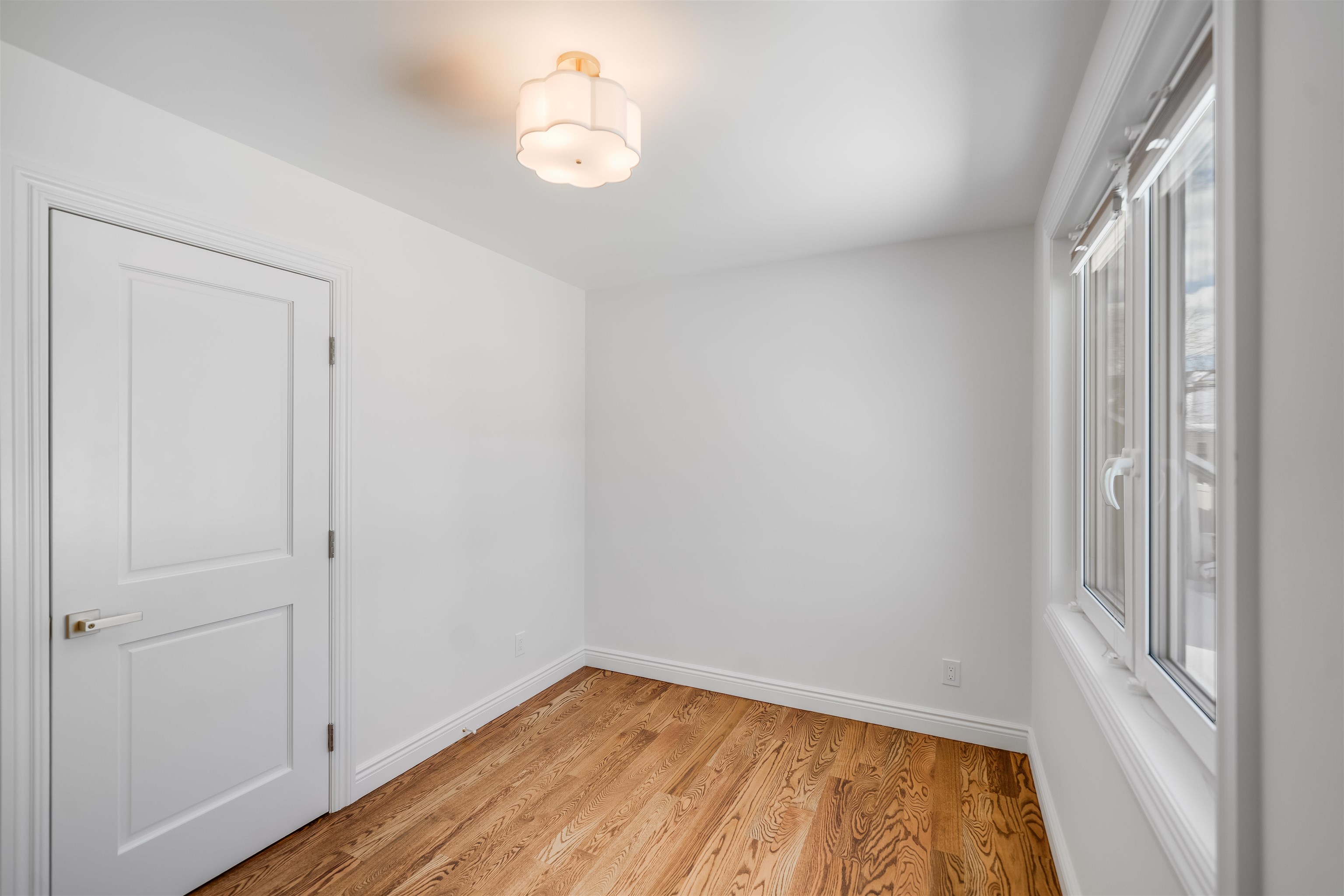 11 Walnut Street, Unit 1 Little Falls, NJ 07424 - Photo 14 of 24 a view of room with window and hardwood floor