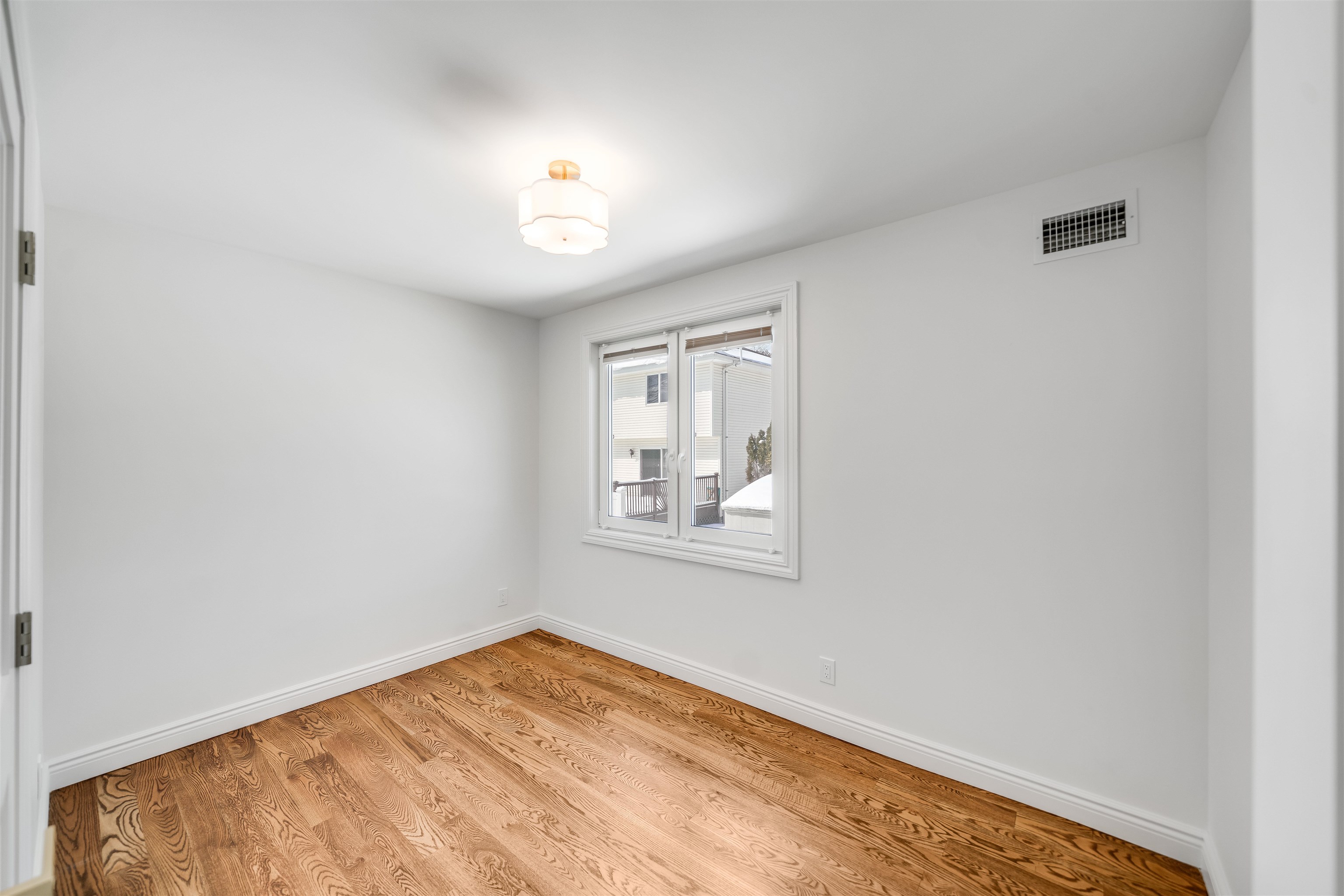 11 Walnut Street, Unit 1 Little Falls, NJ 07424 - Photo 15 of 24 an empty room with windows