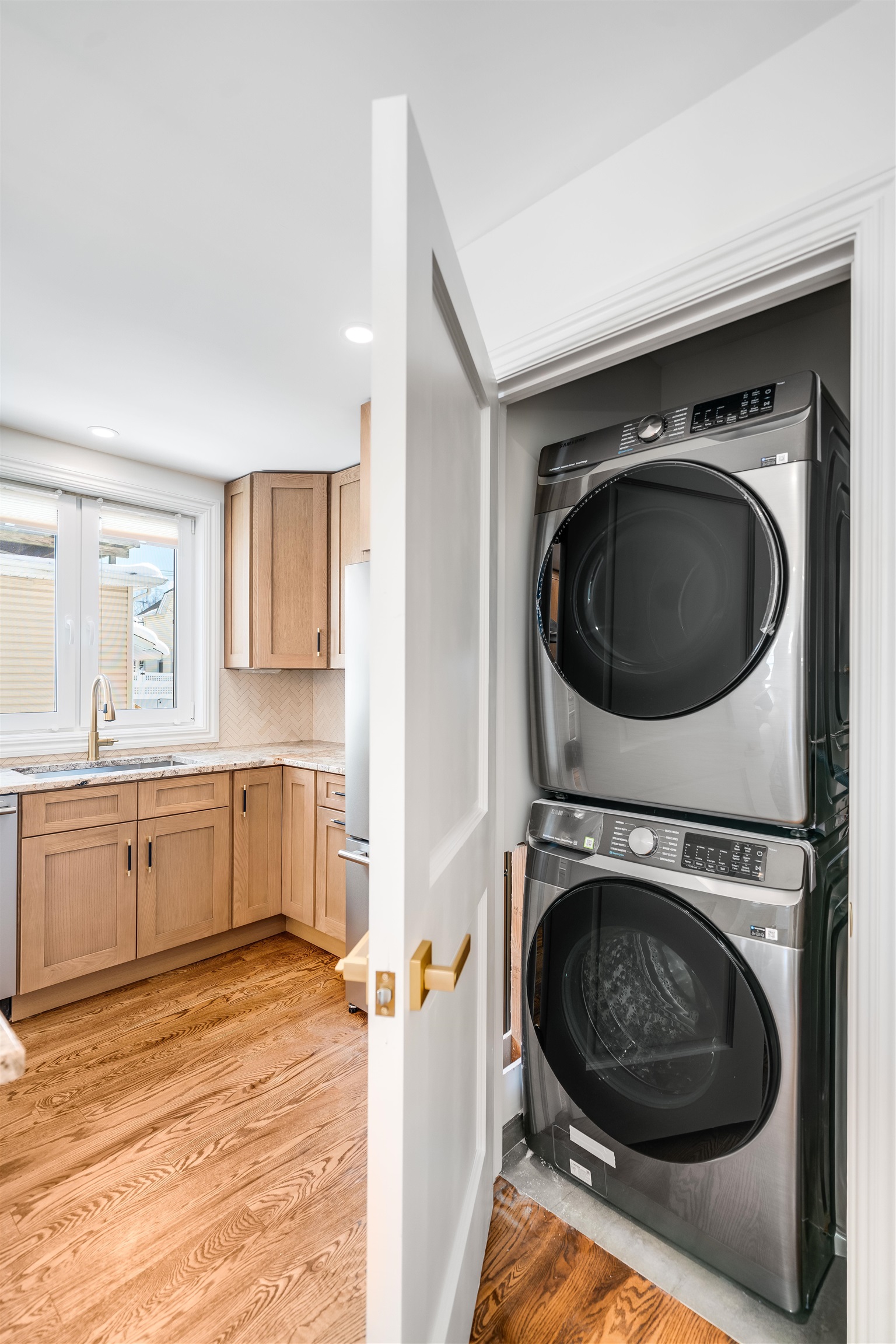 11 Walnut Street, Unit 1 Little Falls, NJ 07424 - Photo 17 of 24 a view of a kitchen with a washer and dryer