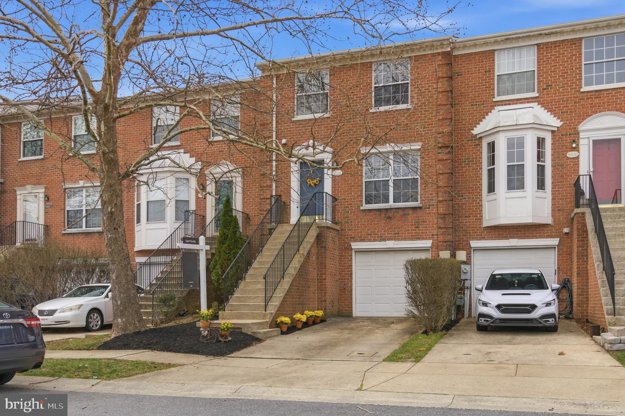 9054 Constant Course Columbia, MD 21046 - Photo 1 of 61 a front view of a house with a yard