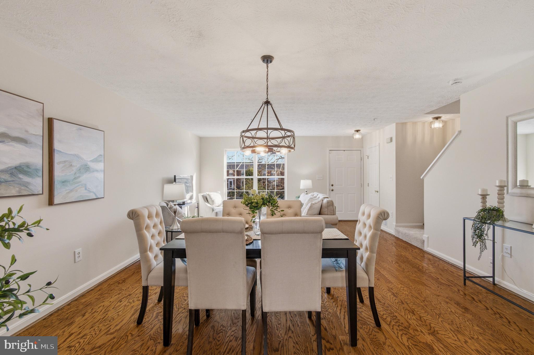 9054 Constant Course Columbia, MD 21046 - Photo 23 of 61 a view of a dining room with furniture window and wooden floor