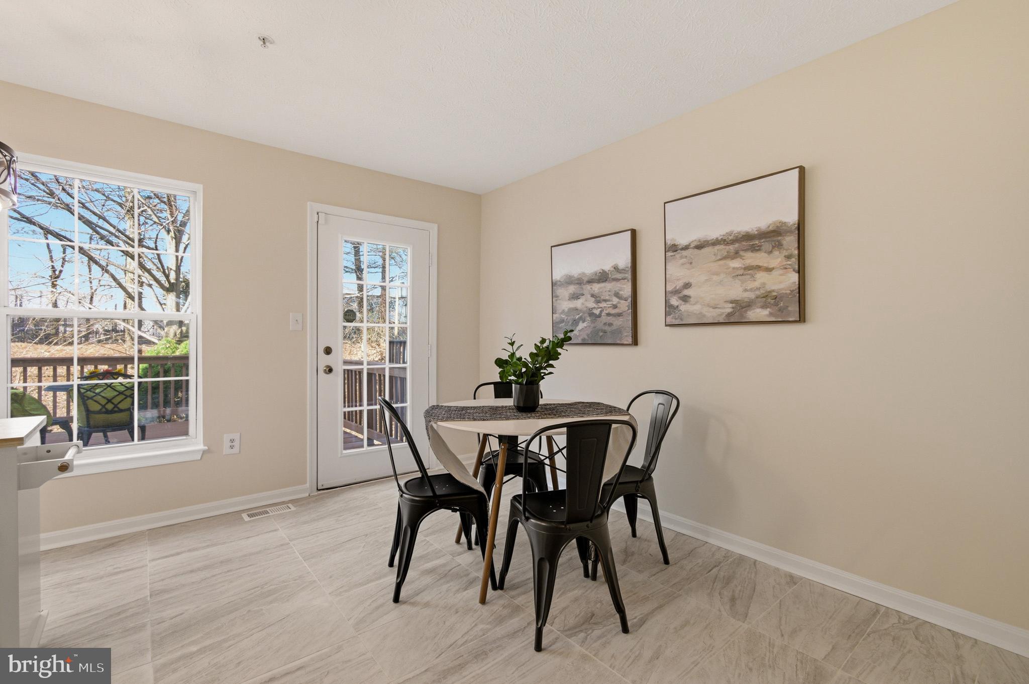 9054 Constant Course Columbia, MD 21046 - Photo 24 of 61 a view of a dining room with furniture and window