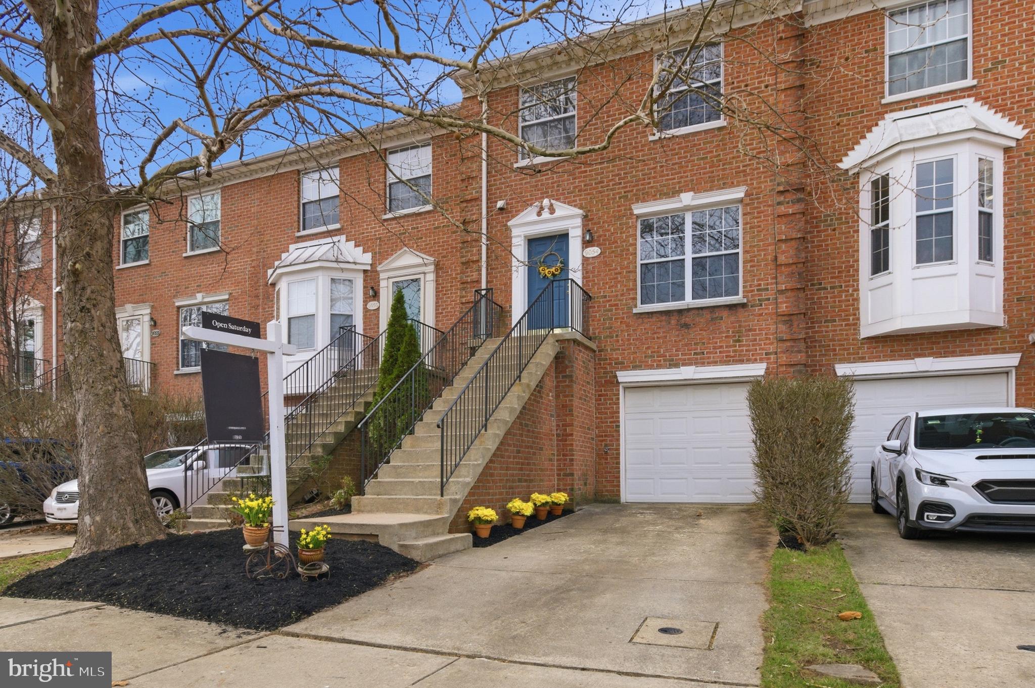9054 Constant Course Columbia, MD 21046 - Photo 3 of 61 a view of a building with car parked