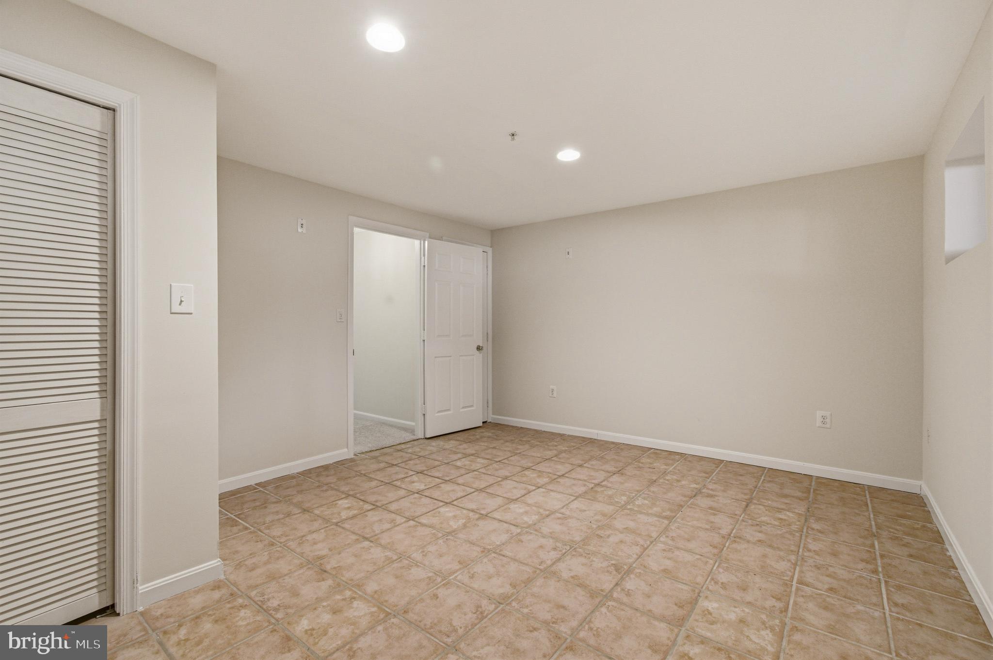 9054 Constant Course Columbia, MD 21046 - Photo 38 of 61 an empty room with a natural light