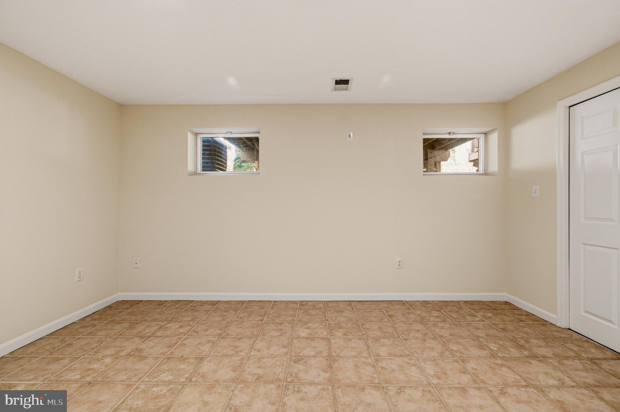 9054 Constant Course Columbia, MD 21046 - Photo 41 of 61 a view of an empty room