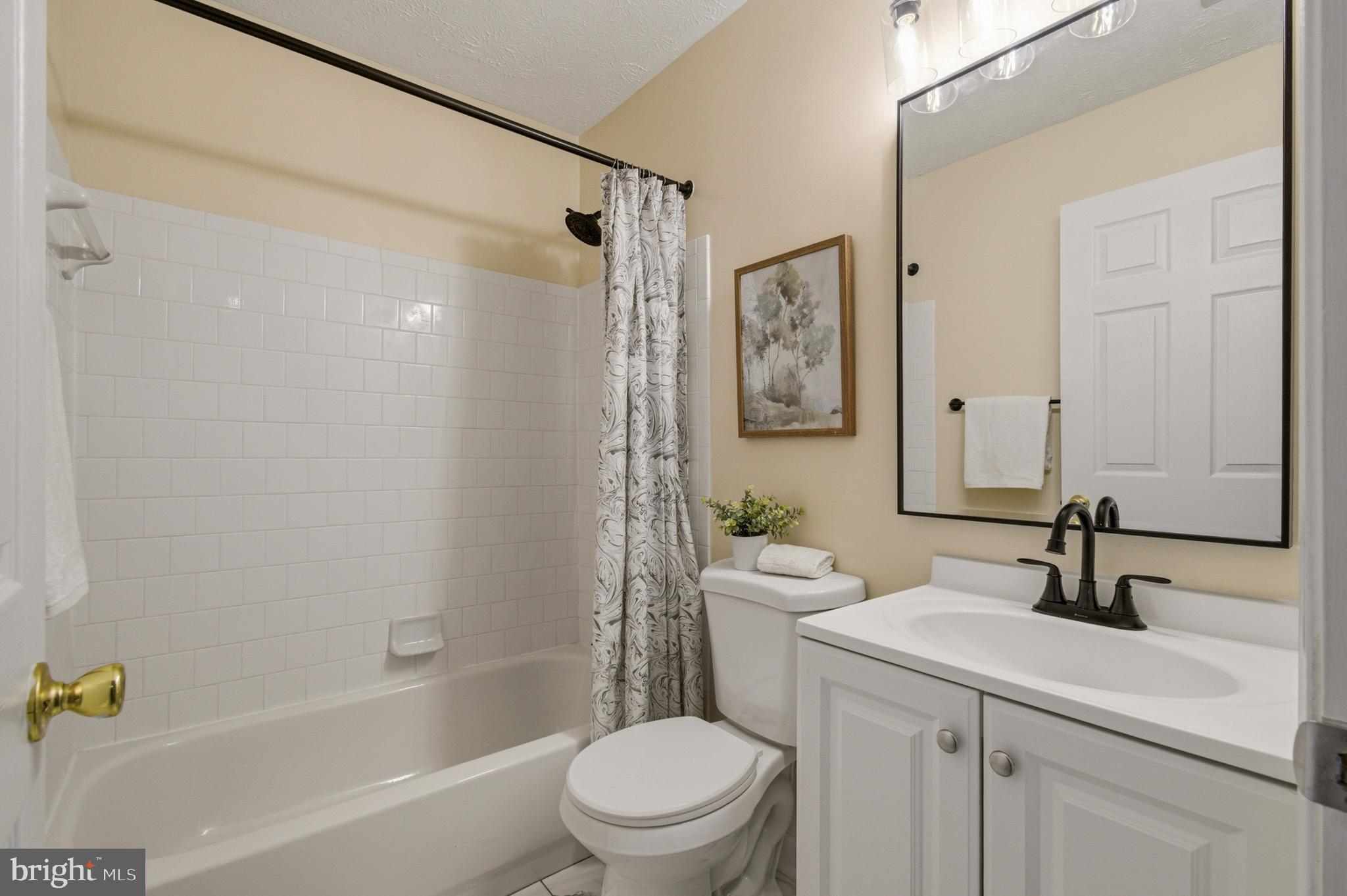 9054 Constant Course Columbia, MD 21046 - Photo 44 of 61 a bathroom with a sink toilet and shower