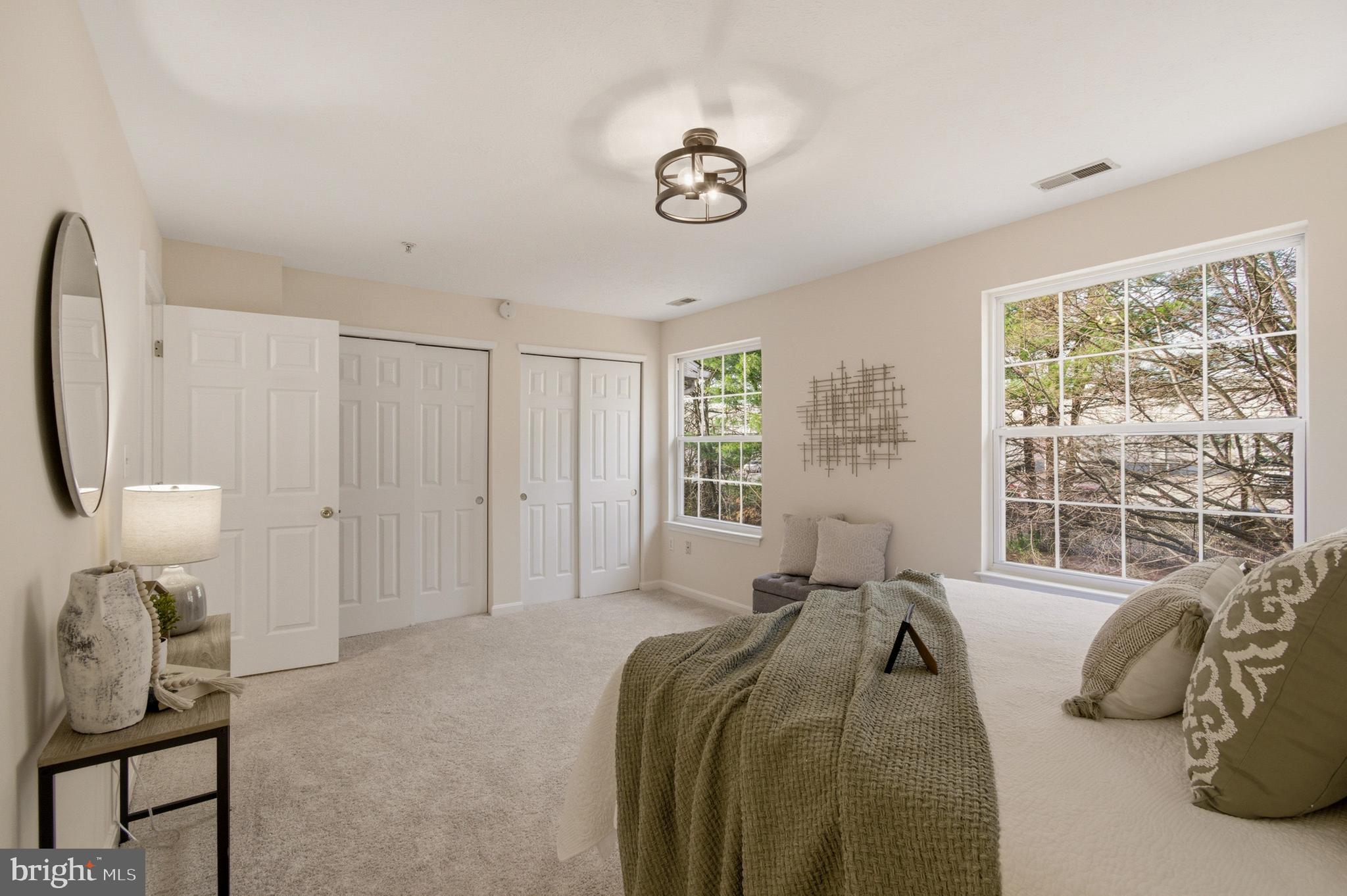 9054 Constant Course Columbia, MD 21046 - Photo 53 of 61 a bed room with a bed and a window