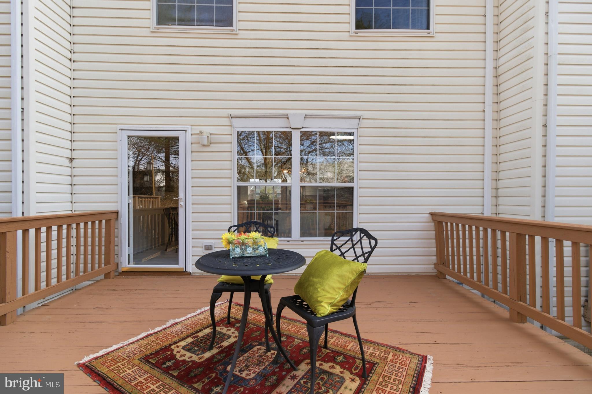 9054 Constant Course Columbia, MD 21046 - Photo 60 of 61 a view of a two chairs in the balcony