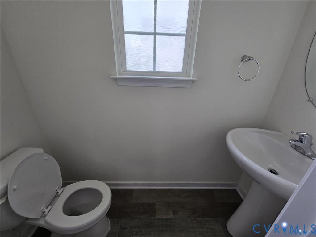 7825 Old Guild Road Richmond, VA 23237 - Photo 12 of 27 Powder room featuring a pedestal sink with chrome
