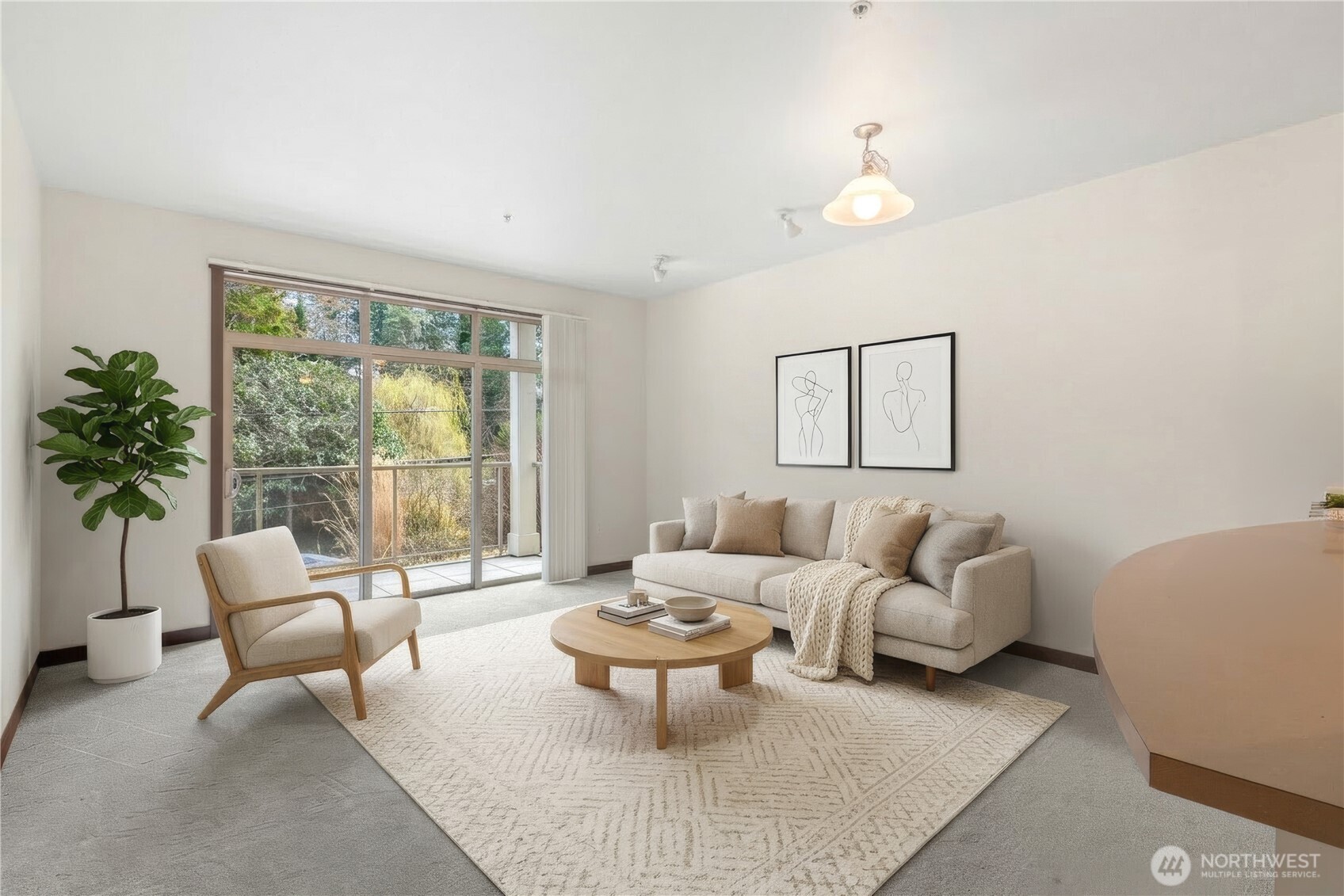 910 Gladstone Street, Unit 103 Bellingham, WA 98229 - Photo 1 of 28 a living room with furniture and a large window