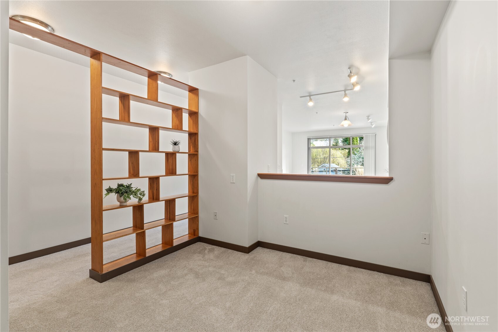 910 Gladstone Street, Unit 103 Bellingham, WA 98229 - Photo 17 of 28 an empty room with windows and closet