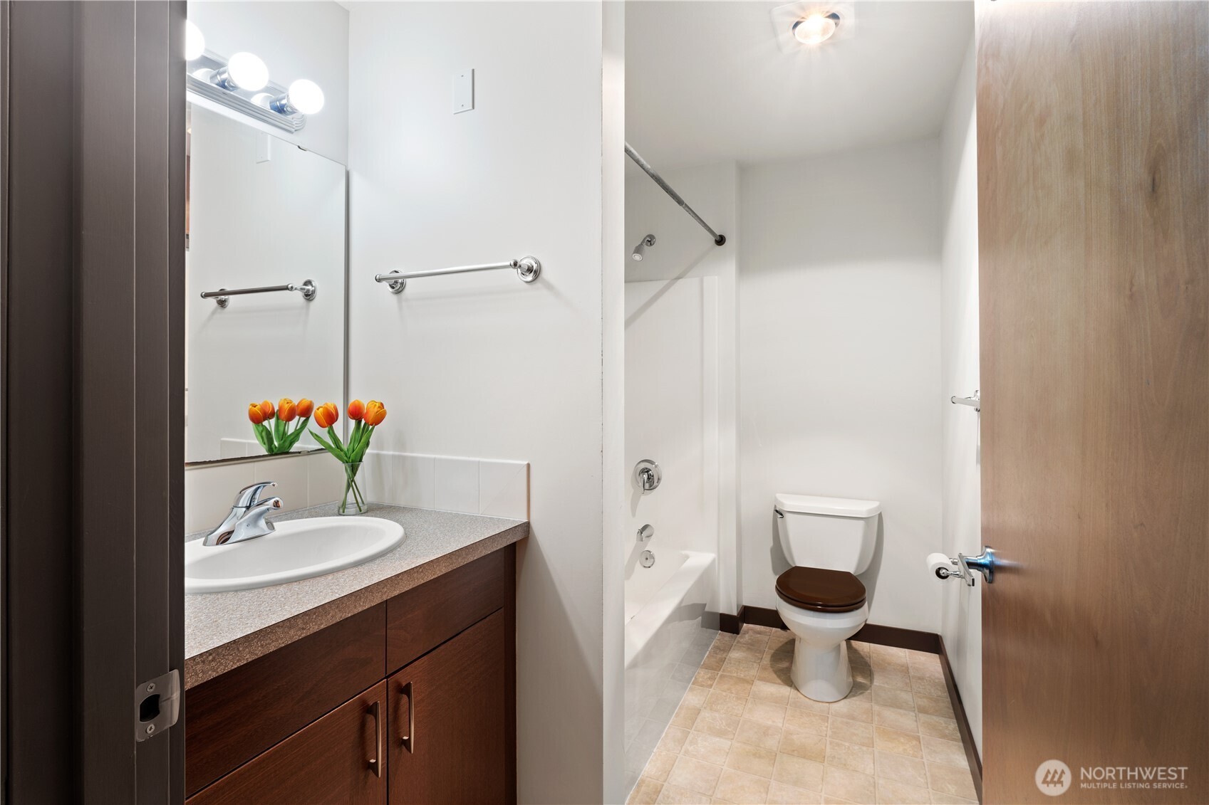 910 Gladstone Street, Unit 103 Bellingham, WA 98229 - Photo 20 of 28 a bathroom with a sink toilet and shower