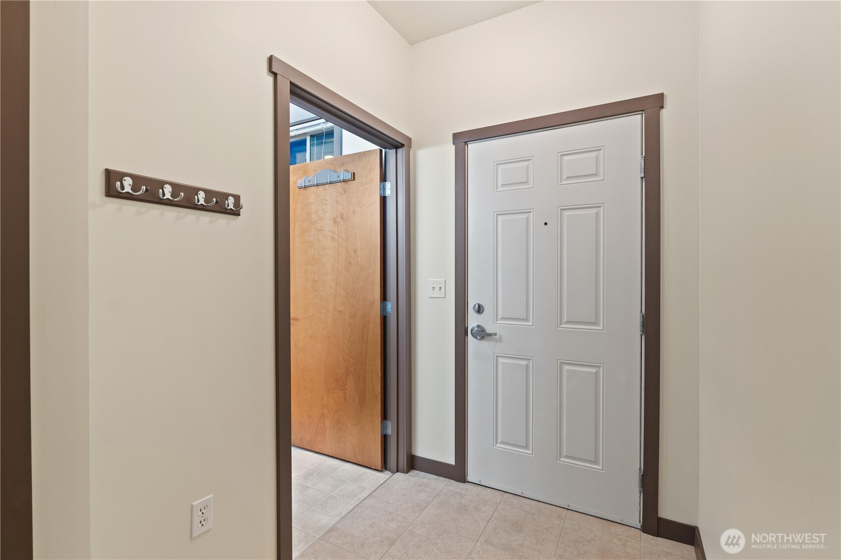 910 Gladstone Street, Unit 103 Bellingham, WA 98229 - Photo 22 of 28 a view of a hallway with wooden floor